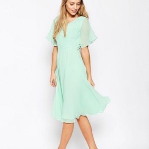 ASOS mint green midi dress with lace detail.